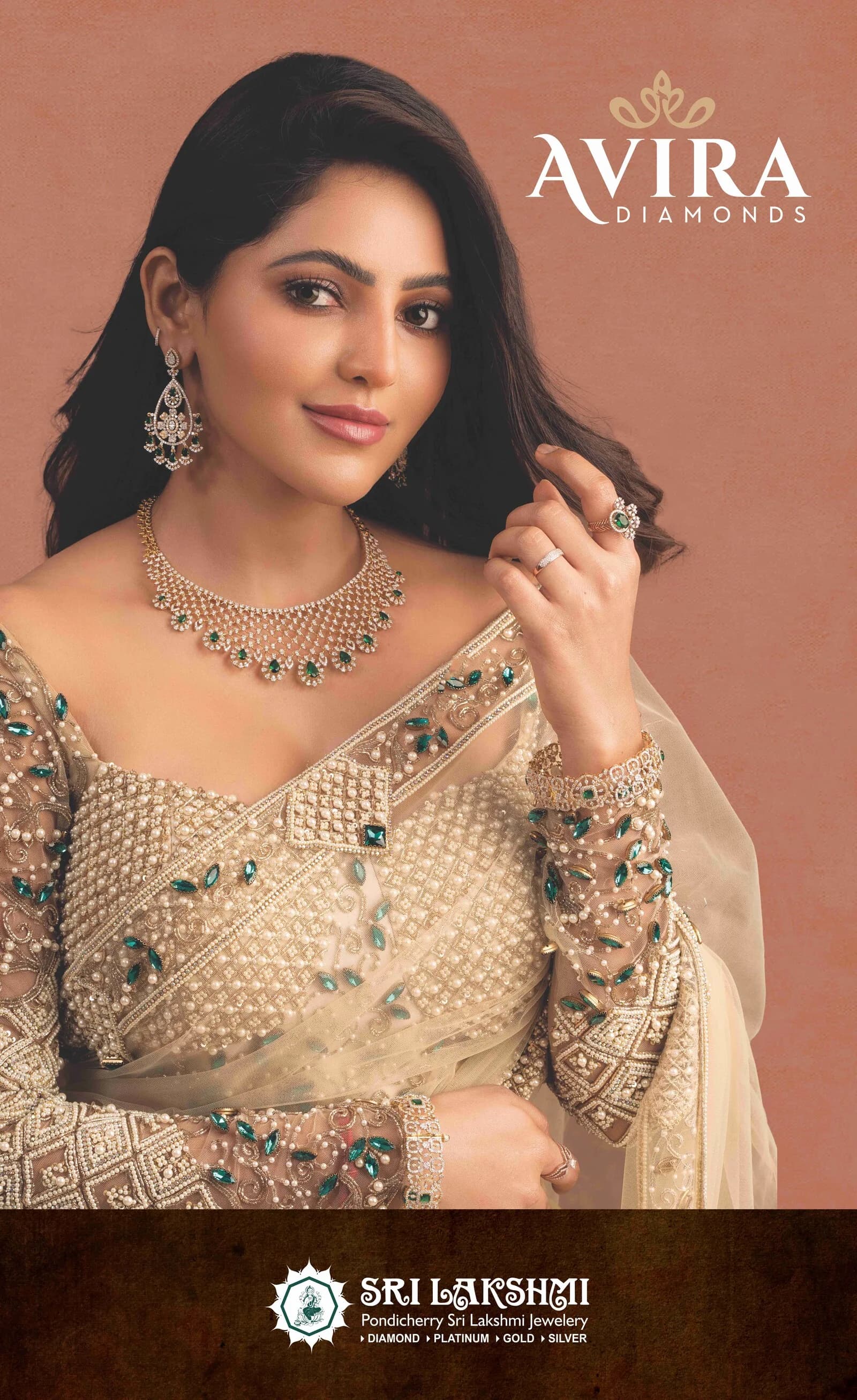 AVIRA Diamonds bridal campaign model portrait in emerald-embellished saree with diamond necklace