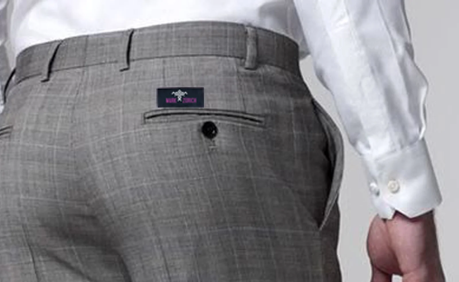 Mark Zürich woven waistband label on tailored trousers