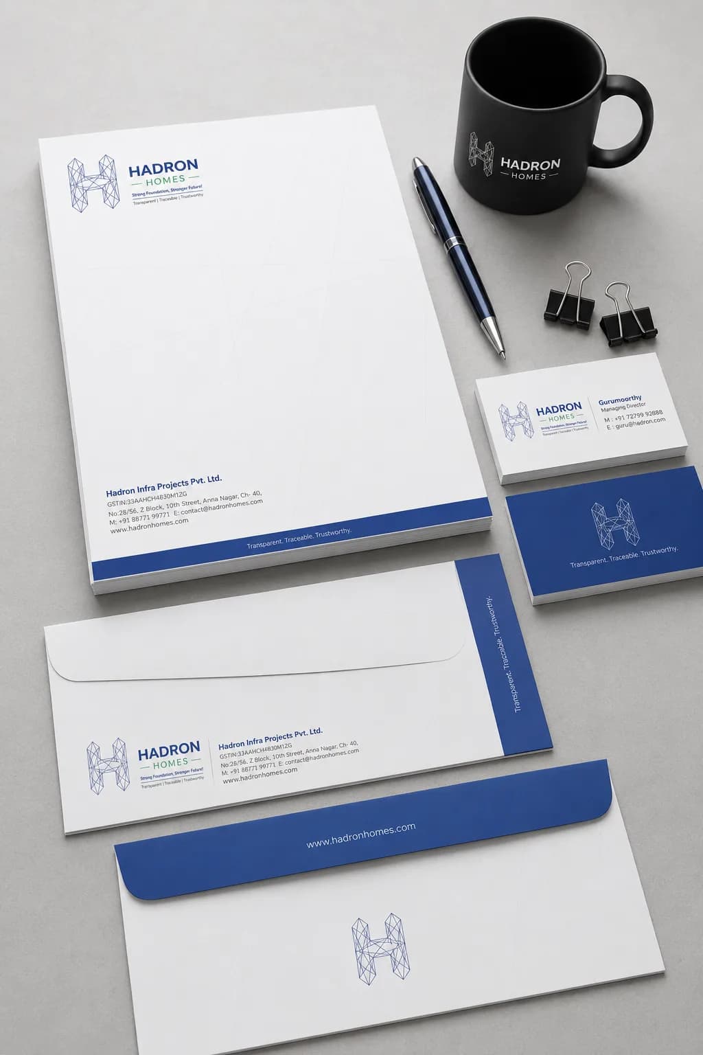 Hadron Homes stationery mockup — letterhead, envelopes and business cards