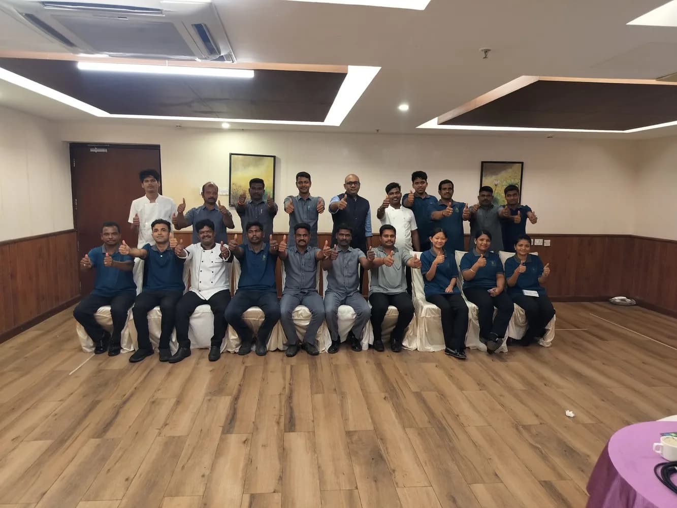 Corporate team celebrating after an organisational development workshop