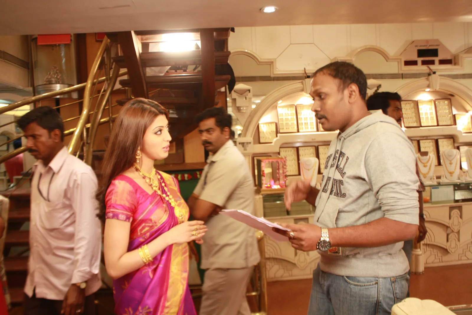 Suresh Ramakrishnan directing a jewellery brand ad film with a celebrity model on set